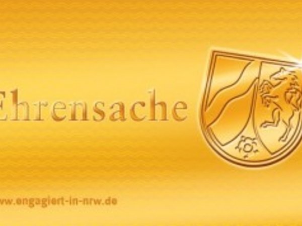 Goldene Karte mit dem Aufdruck Ehrensache