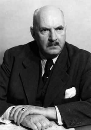 Dr. jur. Dr. h.c. Robert Lehr Mann mit Schnäuzer, Halbglatze und Anzug